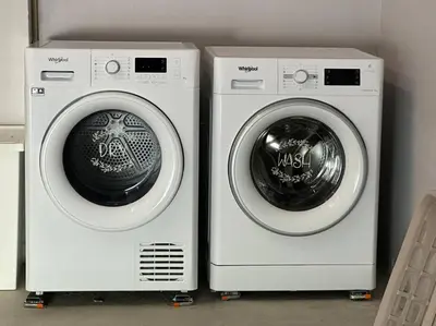 two washing machines sitting next to each other at Urban Views - ML Apart Inspired in Serralves in Porto
