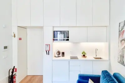 a bathroom with a shower with a glass door at Inspiring City Center 1 BR Apartment with a View in Porto