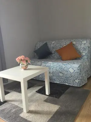 a living room with a couch and a table at Vicky Porto in Porto