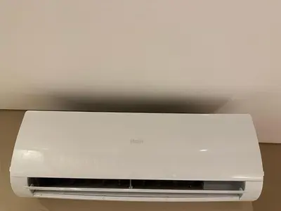 a white computer printer sitting on top of a wall at House Real Companhia in Vila Nova de Gaia