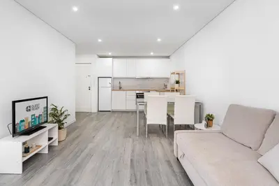 a living room with a couch and a table at GuestReady - Casegas residence in Marquês in Porto