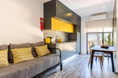 a living room with a couch and a table at Host Wise - Amadeo Apartments in Vila Nova de Gaia
