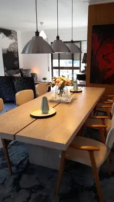 a dining room with a wooden table and chairs at BEST View DOURO PORTO Penthouse in Vila Nova de Gaia