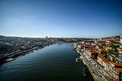 an aerial view of a river with a city at Porto Apartments in Porto