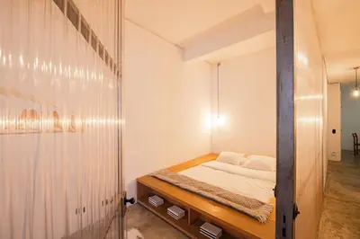 a small bedroom with a bed in a room at Babel in Porto
