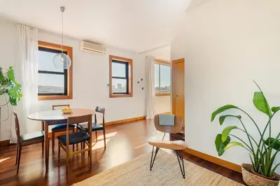 a dining room with a table and chairs at Hey Apartments A in Porto