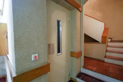 a hallway with a staircase and a stair case at Antero sweet & cozy apartment by PCH in Porto