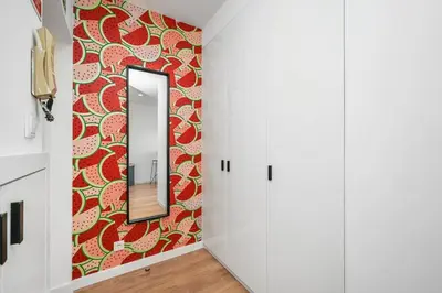 a white bathroom with a sink and a shower at Constituição Flat by Amber Star Rent in Porto