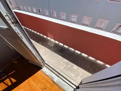 an open door to a balcony of a building at BREINER 54 in Porto