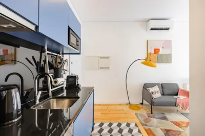 a room with a window with white curtains at Oporto Urban Mood in Porto