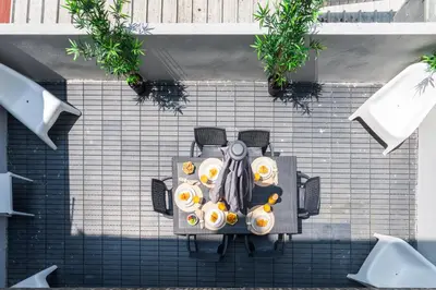 an overhead view of a table with food on it at Host Wise - Modern Flats with Stunning Terrace or Balcony - Central Location in Porto