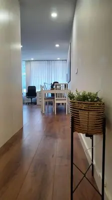 a living room with a table and a dining room at A H - Apartment Oporto Downtown in Porto