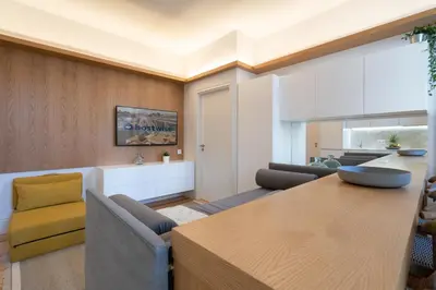 a living room with a couch and a table at Host Wise - Refreshing Cozy Flat - Garden & Terrace in Porto