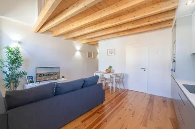 a living room with a couch and a table at Host Wise - Lovely & Cozy Duplex Flat in Porto
