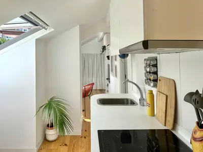 a kitchen with a sink and a counter top at Art Cottage with oPorto View! in Vila Nova de Gaia