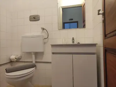 a bathroom with a toilet and a sink at DISCOVER PORTO - Boavista 3 in Porto