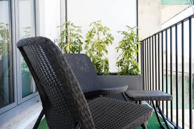 two chairs and a table on a balcony at GuestReady - Serene stay in Porto in Porto