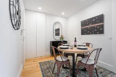 a dining room with a table and chairs at GuestReady - Serene stay in Porto in Porto