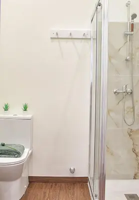 a bathroom with a shower and a toilet at Oporto Sweet Downtown 5 in Porto