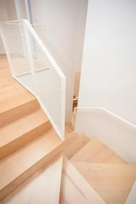 a stairwell with a white stair case at Liiiving in Porto - Cedofeita Green Terrace in Porto