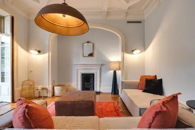 a living room with a couch and a fireplace at Porto Premium Villa in Porto