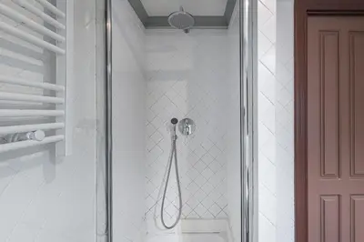 a shower stall in a bathroom with a toilet at GuestReady - Belle Epoque Apartments in Porto