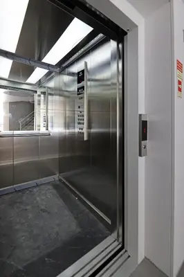 a glass door of a refrigerator in a room at FLH Boavista Wooden Flats in Porto