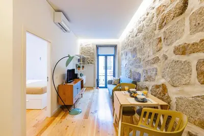 a glass door with a view of a balcony at Netto City Vibes in Porto