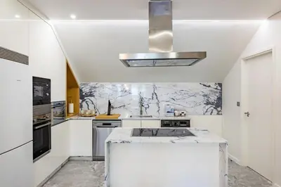 a bathroom with a sink and a shower at Porto City Holidays by Douro River in Porto