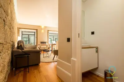 a living room with a couch and a table at Trendy Porto in Porto