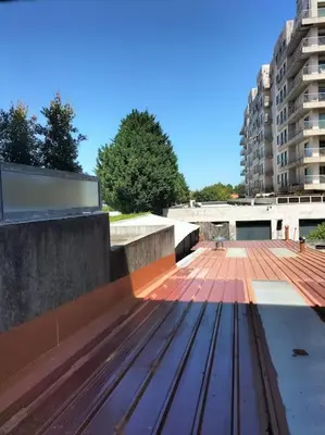 a view of a wooden deck on a building at Constituição 1012 in Porto