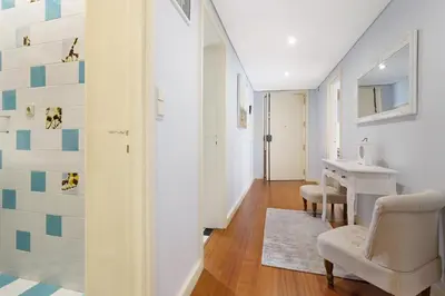a room with a desk and a chair and a table at Apartment Boutique Santa Catarina 1 in Porto