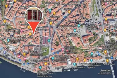 a map of a city with a red circle at River Flat III - Heart of Porto in Porto
