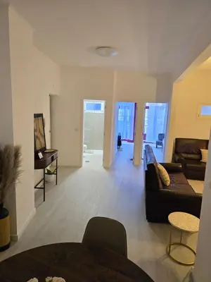 a living room with a couch and a table at River Flat III - Heart of Porto in Porto