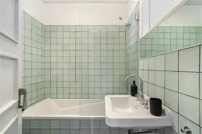 a bathroom with a sink and a bath tub at WHome SC996 in Top Location 3-Bed Perfect to explore Porto in Porto