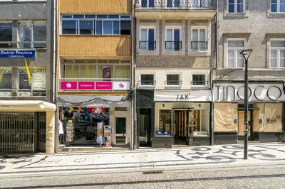 a group of buildings on a city street at WHome Timeless Luxury Porto w/ AC & Elevator in Porto