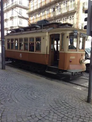 an old trolley car on a city street at Porto Chique AL 2 in Porto