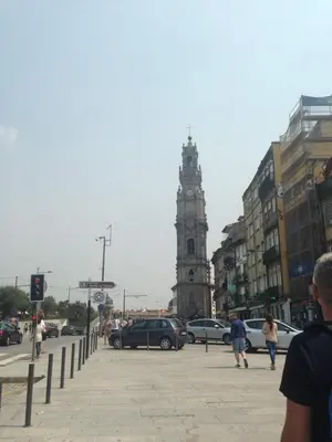 a city street with a clock tower in the distance at Porto Chique AL 2 in Porto