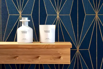 two bottles ofodorizers sitting on a wooden shelf at VIVA Formosa Flat in Porto