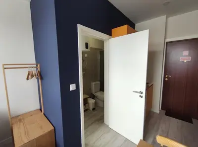 an open door to a bathroom with a toilet at Leote House - Studio 2 in Porto