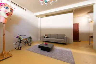 a living room with a couch and a table at Leote House - Studio 3 in Porto