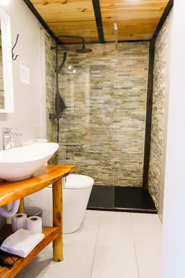 a bathroom with a sink and a shower at The Loft 333 in Porto