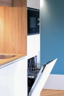 a kitchen with a stove top oven and a dishwasher at HM - Infante Riverside Apartment C in Porto