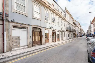 a street with buildings and cars parked on the street at VIVA Old Franciscan Studio in Porto