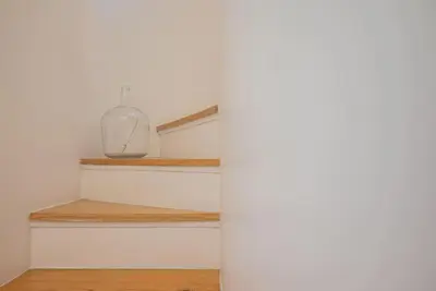 a room with stairs with a glass jar on it at Gardeny Porto in Porto