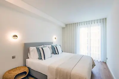 a living room with a table and a couch at Renovato Prestige in Porto