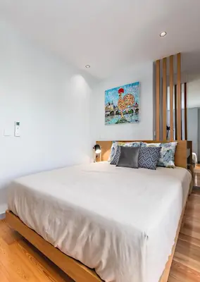 a bedroom with a large bed with white sheets at Almada 505 - Premium Flat in Porto