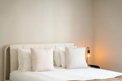a white bed with white pillows in a bedroom at Gaia Retreat by LovelyStay in Vila Nova de Gaia
