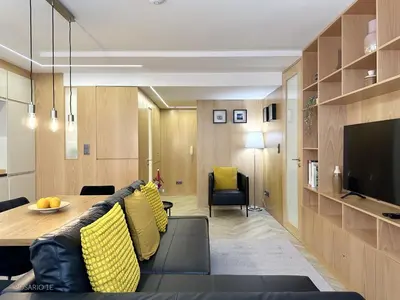 a living room with a couch and a table at ROSARIO 1E by rosario inn porto in Porto
