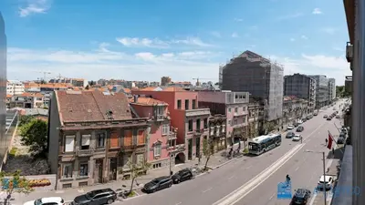 a view of a city street with cars and buildings at Y Trendy Arthouse Boavista in Porto